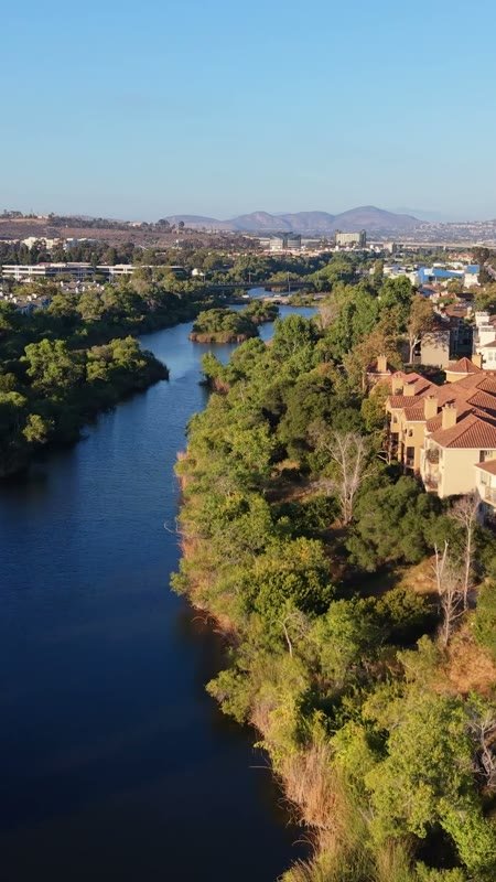 San Diego River Winding Past Riverside Townhomes in Mission Valley (Vertical)