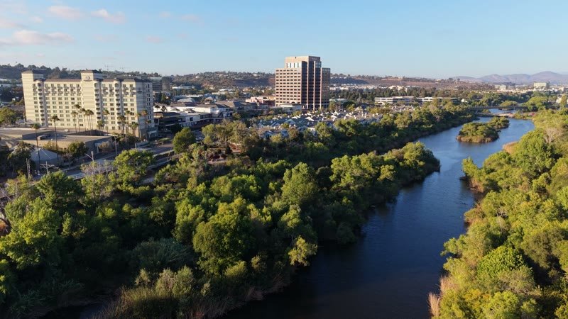 Lush San Diego River Bend Below the Mission Valley Skyline – Aerial View