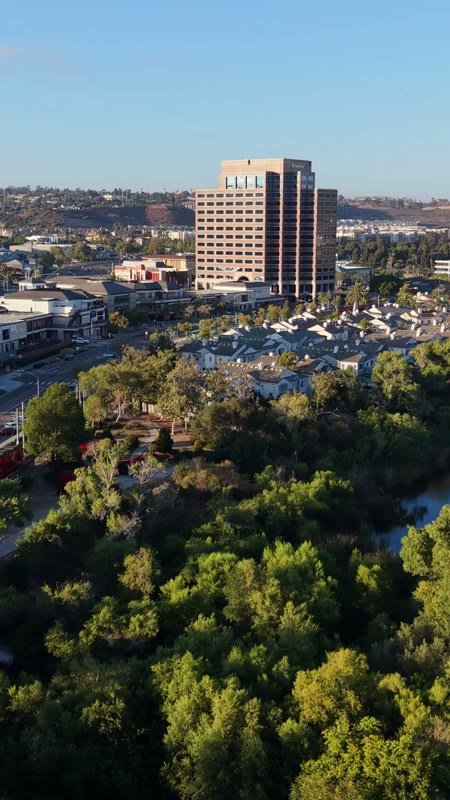 Mission Valley Hotel District and Trolley Along the San Diego River – Aerial View (Vertical)