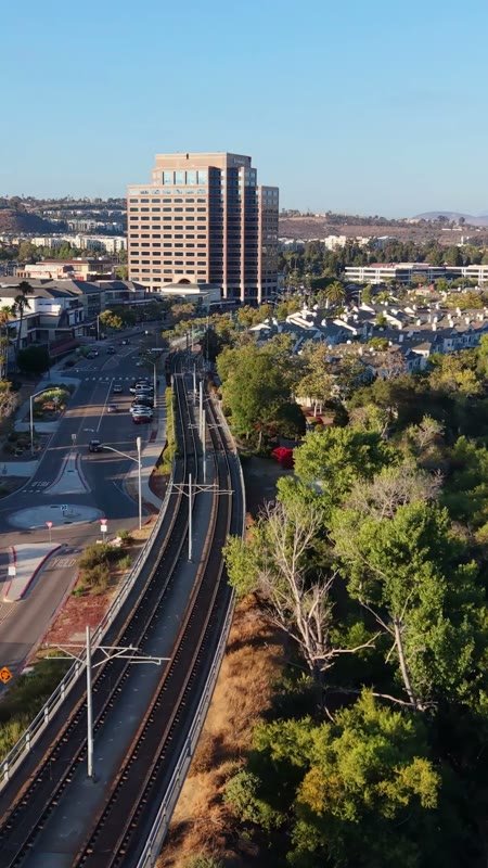 Lush San Diego River Bend Below the Mission Valley Skyline – Golden Hour Frame (Vertical)