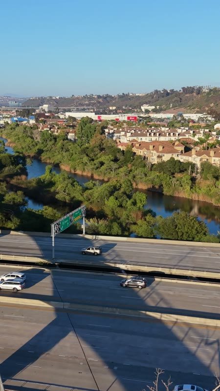 San Diego River and the Interstate 8 Bridge Beside Mission Valley Apartments – Aerial View (Vertical)