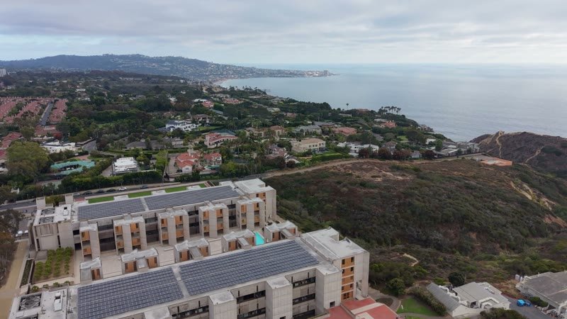 Salk Institute’s Twin Concrete Wings Above the La Jolla Bluffs – Wide Establishing Frame