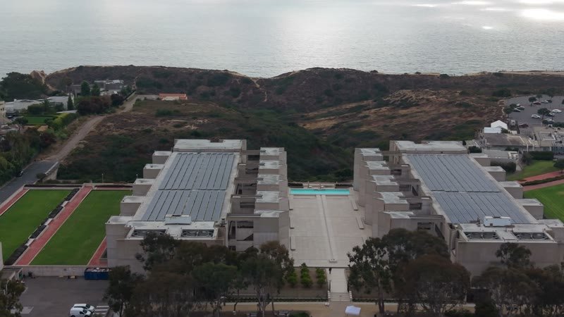 Aerial Profile of the Salk Institute Above La Jolla Shores – Low Drone Approach