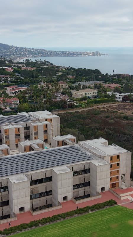 Salk Institute’s Twin Concrete Wings Above the La Jolla Bluffs – Elevated Perspective (Vertical)