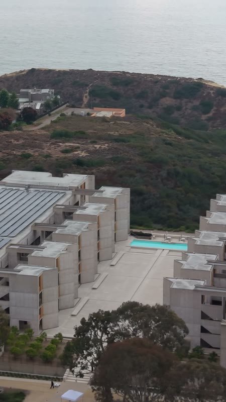 Aerial Profile of the Salk Institute Above La Jolla Shores – Sweeping Aerial (Vertical)