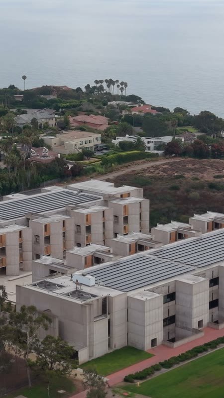Aerial Profile of the Salk Institute Above La Jolla Shores – Golden Hour Frame (Vertical)