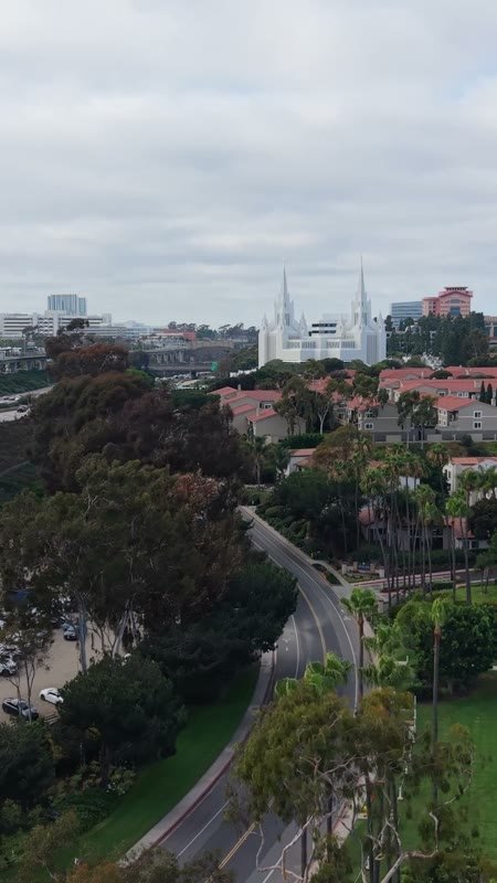 Distant San Diego Temple Spires Beyond the Trolley and Tree-Lined Canyon (Vertical)