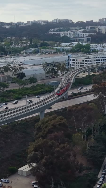 San Diego Trolley Crossing the I-5 Freeway Toward University City (Vertical)