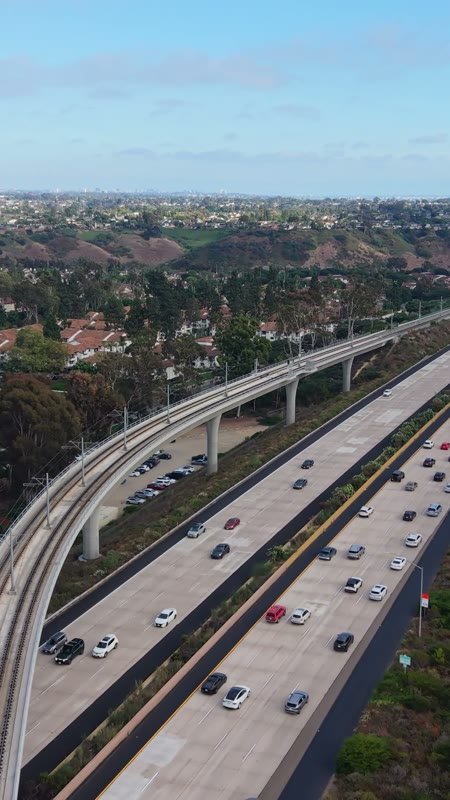 Elevated Trolley Guideway Curving Above the I-5 in University City (Vertical)