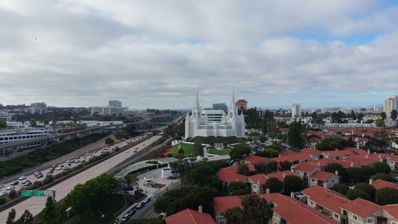 San Diego Temple Rising Beyond University City Rooftops – Wide Establishing Frame