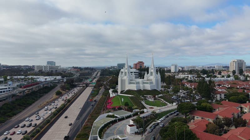 San Diego Temple Rising Beyond University City Rooftops – Golden Hour Frame