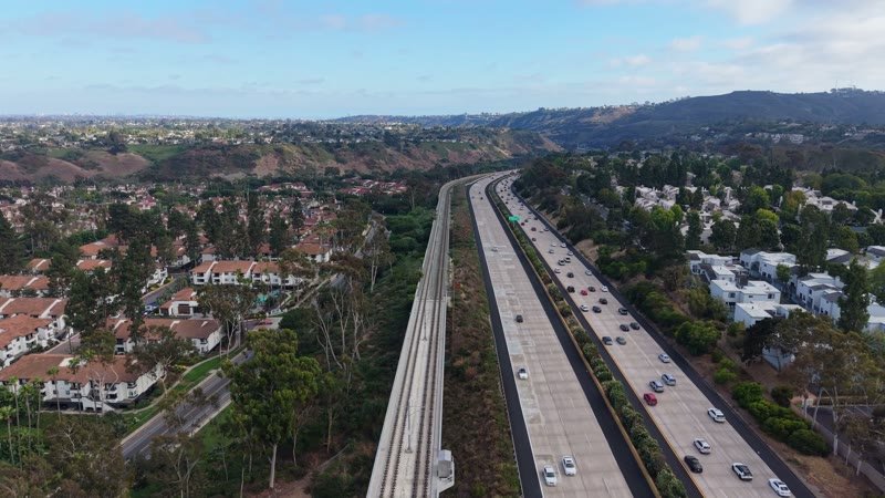 Interstate 5 and the Trolley Line Winding Through University City – Aerial View
