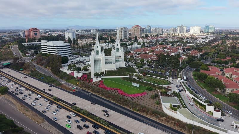 San Diego California Temple and Gardens Beside the I-5 Freeway – Cinematic Drone Angle