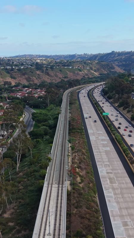 Interstate 5 and the Trolley Line Winding Through University City – Wide Establishing Frame (Vertical)