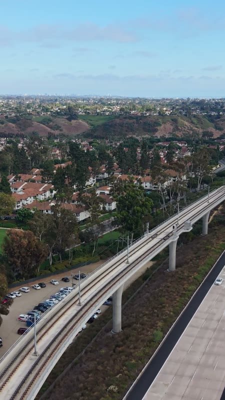 Elevated Trolley Guideway Curving Above the I-5 in University City – Overhead Detail (Vertical)