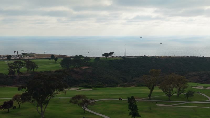 Distant Paragliders Over the Pacific Beyond Torrey Pines Fairways