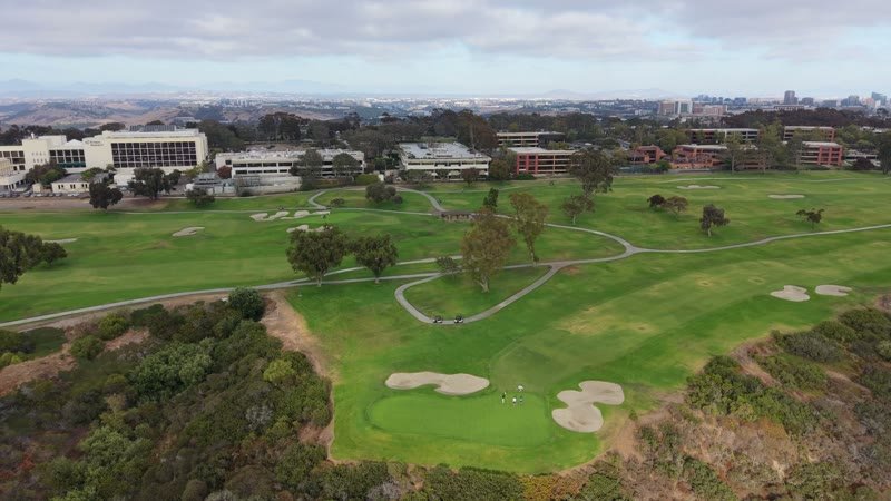 Golfers on the Green at Torrey Pines with the City Mesa Beyond – Aerial View
