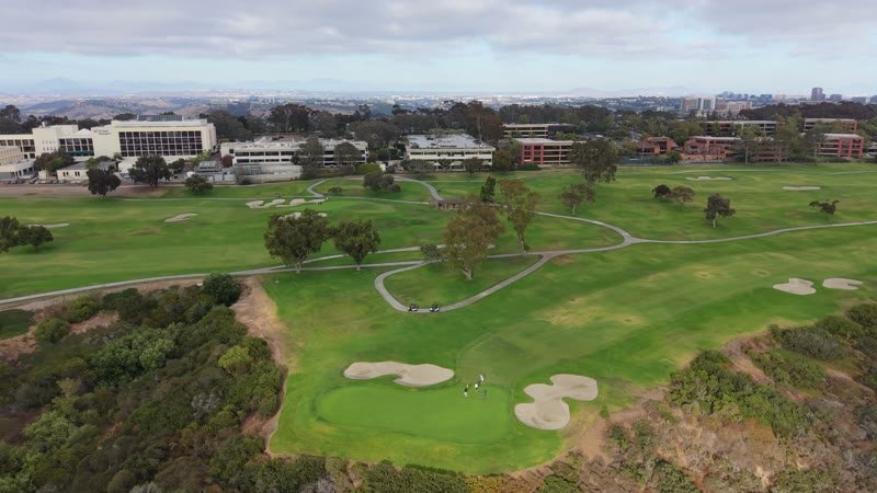 Golfers on the Green at Torrey Pines with the City Mesa Beyond – Elevated Perspective