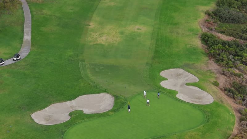 Overhead of a Torrey Pines Green Framed by Twin Sand Bunkers – Aerial View