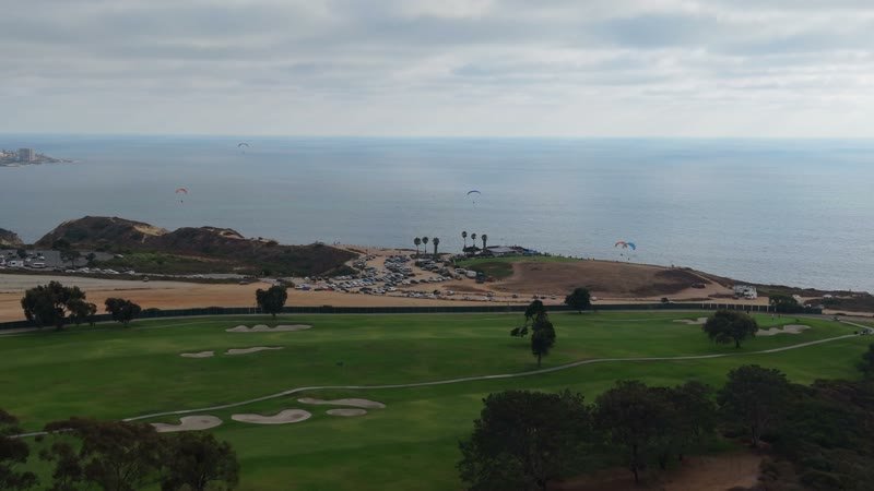 Torrey Pines Fairways with Paragliders Drifting Over the Sea – Elevated Perspective