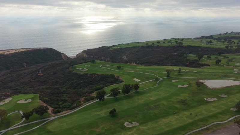 Clifftop Fairways of Torrey Pines Overlooking the Sunlit Pacific – Wide Establishing Frame
