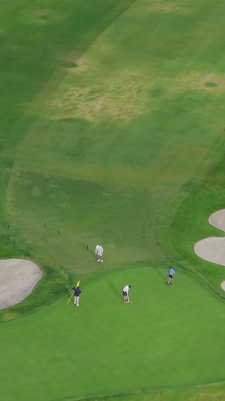 Overhead of a Torrey Pines Green Framed by Twin Sand Bunkers – Wide Establishing Frame (Vertical)