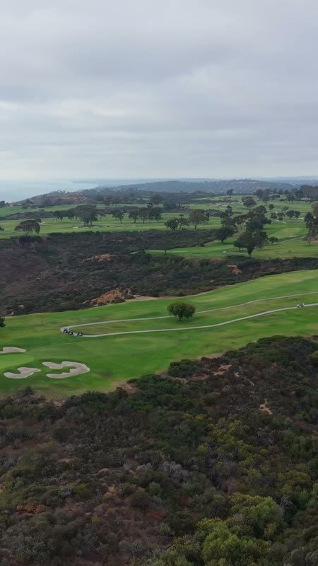 Sweeping View of Torrey Pines Golf Course and the Coastal Canyons – Aerial View (Vertical)