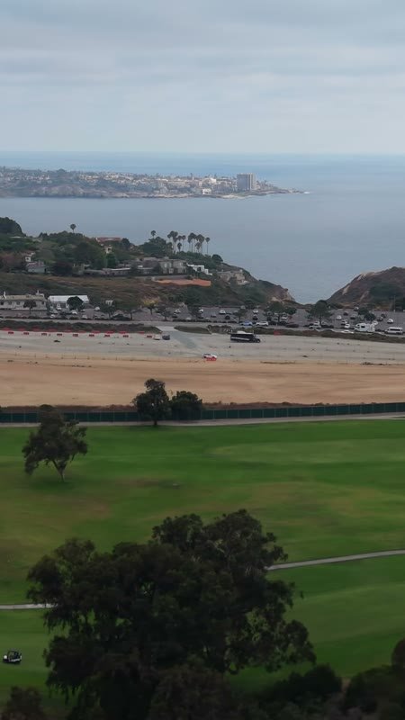 Torrey Pines Greens Above the Gliderport and La Jolla Cove – Wide Establishing Frame (Vertical)