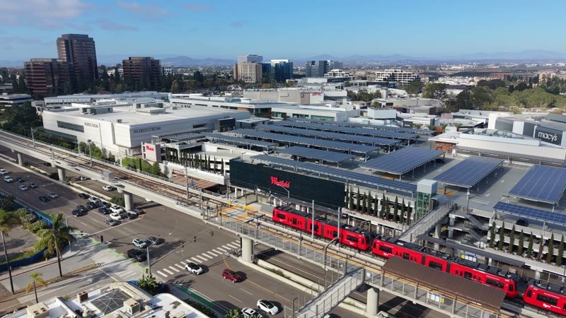 Red Trolley Passing Westfield UTC Along La Jolla Village Drive
