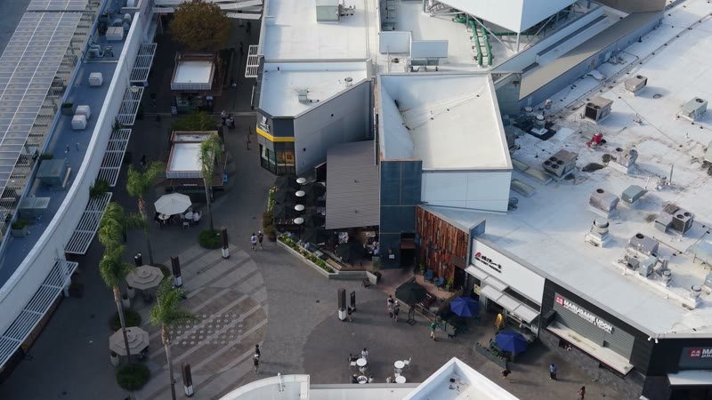 Outdoor Dining Terrace and Shops at University Town Center – Elevated Perspective