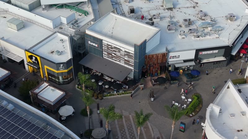 Outdoor Dining Terrace and Shops at University Town Center – High-Angle Panorama