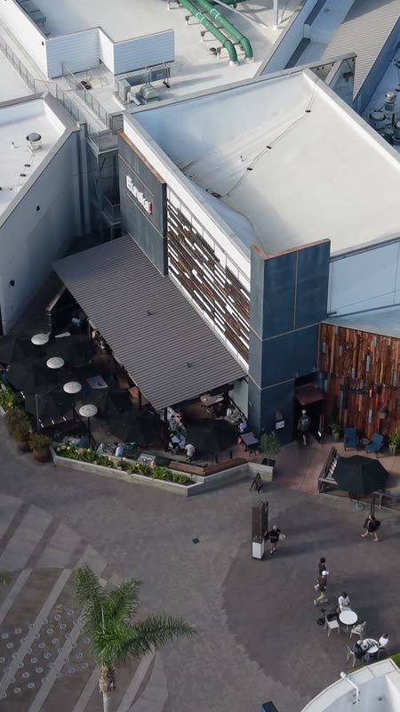 Outdoor Dining Terrace and Shops at University Town Center – Overhead Detail (Vertical)