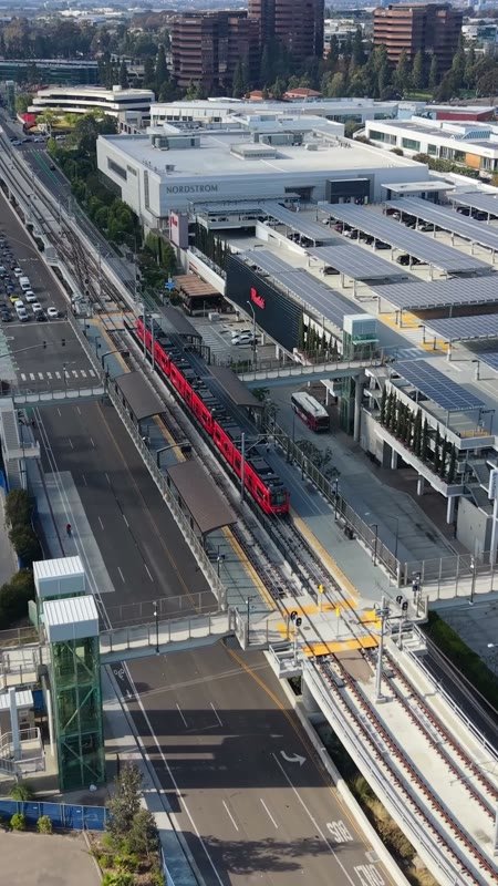 Aerial of the UTC Trolley Station and University City High-Rises – Wide Establishing Frame (Vertical)