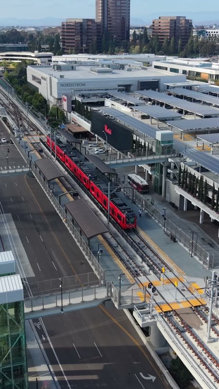 Aerial of the UTC Trolley Station and University City High-Rises – High-Angle Panorama (Vertical)